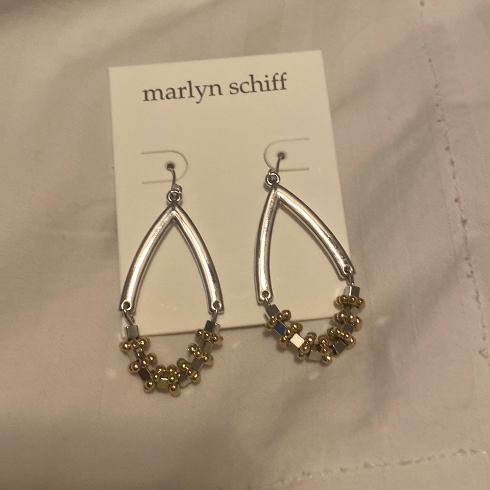 Silver and gold dangle earring